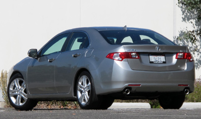 A three-quarter rear view of a 2011 Acura TSX Tech V6 A three-quarter rear view of a 2011 Acura TSX Tech V6