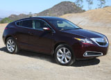 A three-quarter front view of a 2010 dark cherry pearl Acura ZDX A three-quarter front view of a 2010 dark cherry pearl Acura ZDX