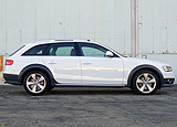 A side view of a white 2013 Audi Allroad