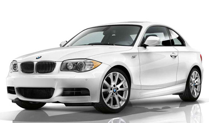 A three-quarter front view of a white 2012 BMW 135i Coupe