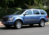 A three-quarter front view of a blue 2007 Chrysler Aspen Limited 4x4