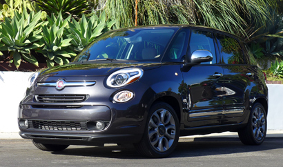 A three-quarter front view of the 2014 Fiat 500L