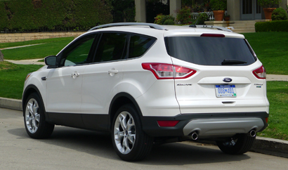 A three-quarter rear view of a 2013 Ford Escape Titanium FWD