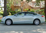 A side view of a 2013 Ford Fusion Hybrid