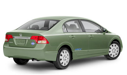 A three-quarter rear view of a green 2009 Honda Civic GX