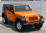 A three-quarter front view of a 2012 Jeep Wrangler Unlimited Sport 4x4 A three-quarter front view of a 2012 Jeep Wrangler Unlimited Sport 4x4