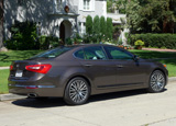 A three-quarter rear view of a 2014 Kia Cadenza A three-quarter rear view of a 2014 Kia Cadenza