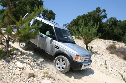 The Land Rover LR3 descends down a steep incline The Land Rover LR3 descends down a steep incline