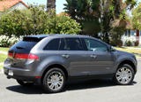 A three-quarter rear view of a 2009 Lincoln MKX