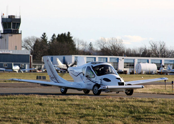 A Terrafugia Transition on the runway and ready for takeoff A Terrafugia Transition on the runway and ready for takeoff