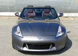 A three-quarter front view of a 2011 Nissan 370Z Roadster Touring A three-quarter front view of a 2011 Nissan 370Z Roadster Touring