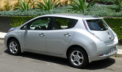 A three-quarter rear view of a 2011 Nissan Leaf