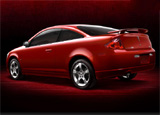A three-quarter rear view of a red 2009 Pontiac G5 Coupe