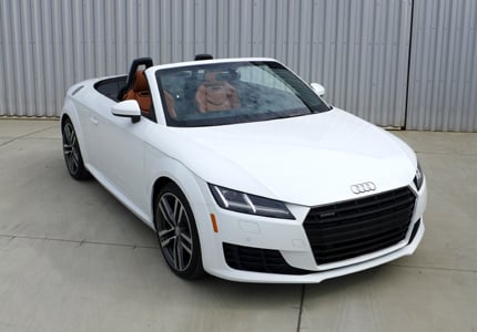 A three-quarter front view of an Audi TT Roadster, one of GAYOT's Top 10 Best Small Cars