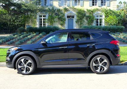 A side view of the Hyundai Tuscon, one of GAYOT's Top 10 Small SUVs