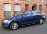A three-quarter front view of a 2013 Volkswagen Jetta Hybrid SE A three-quarter front view of a 2013 Volkswagen Jetta Hybrid SE