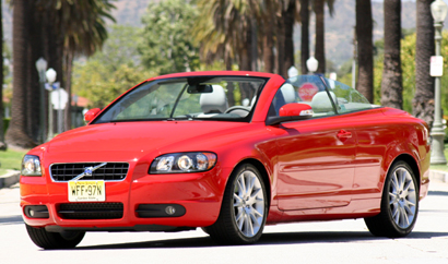 A three-quarter front view of a red 2008 Volvo C70 T5 convertible