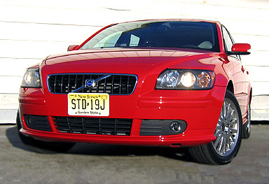 A front view of a red 2006 Volvo V50 T5 AWD