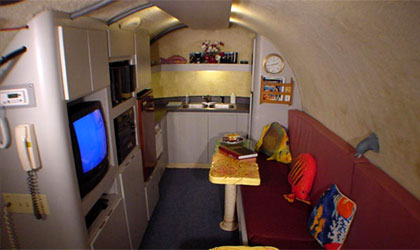 A dining/kitchen area at Jules' Undersea Lodge in Key Largo, Florida 