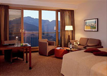 A deluxe guestroom with a mountain view