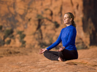A woman in a yoga pose at the Red Mountain Resort in Ivins, Utah A woman in a yoga pose at the Red Mountain Resort in Ivins, Utah