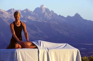 A woman receives a massage at Wilderness Adventure Spa at Spring  Creek Ranch in Jackson, Wyoming
