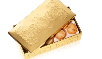 Golden cookie box from the line of gifts from chef Jean-Francois Piege
