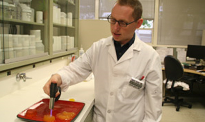 Food scientist Ted Russin demonstrates torching technique Food scientist Ted Russin demonstrates torching technique