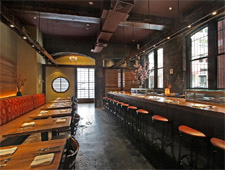 The dining room at o ya in Boston