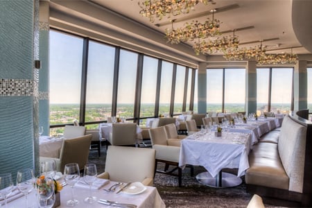 One of the Top 10 Penthouse Restaurants in the U.S., Nikolai's Roof offers stunning views of the city from the 30th floor of the Hilton Atlanta