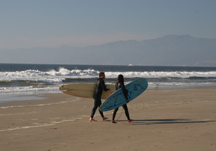 Surfers take to the waves in Santa Monica