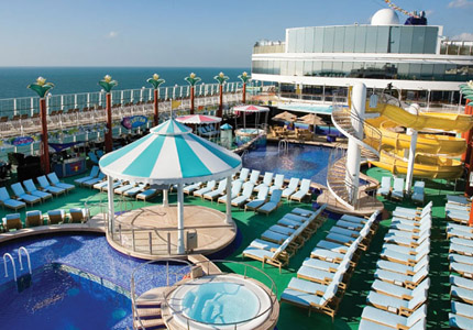 Lay out on the pool deck during your excursion to the Caribbean aboard the Norwegian Gem