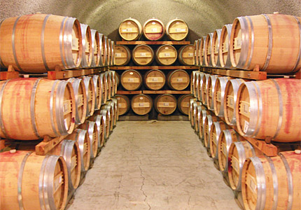 Stacks of barrels aging wine