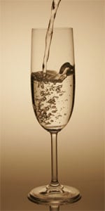 The classic Champagne pouring method dissolves CO2 faster