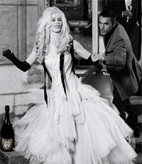 Supermodel Claudia Schiffer dressed in a wedding gown in this exclusive photo by Karl Lagerfeld for Dom Perignon