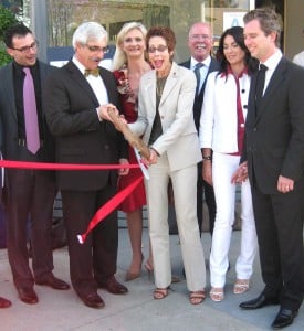 West Hollywood Mayor Abbe Land cutting the ribbon with the Petrossians, the Martinons and Sophie Gayot