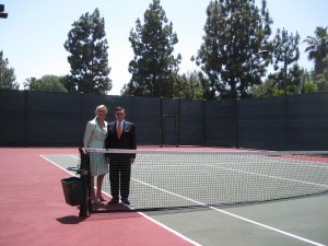  Alberto del Hoyo, General Manager of The Beverly Hills Hotel showing Sophie Gayot the tennis courts before they disappear
