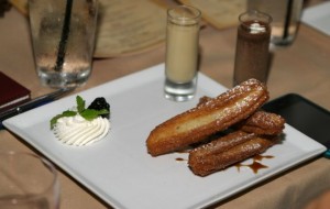 House-made churros with KAHLÚA Especial reduction and KAHLÚA Coffee Cream dipping sauce