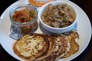 Johnny cakes with Gunthorp Farm pork and chow chow are on the menu at The Southern. Photo courtesy of J. Lasky.