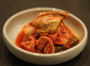 Kimchi, a brined cabbage and turnip dish, is an ubiquitous part of Korean cuisine