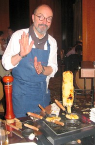 Partner/owner Norbert Wabnig of The Cheese Store of Beverly Hills preparing raclette