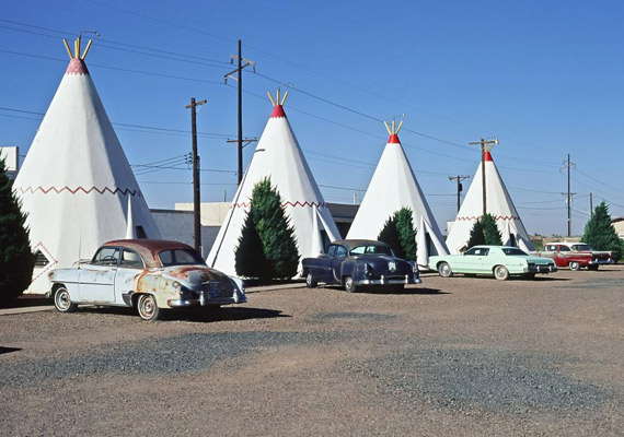 A row of wigwams and classic cars