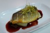 Loup de mer served with caramelized onion, fennel and red wine reduction