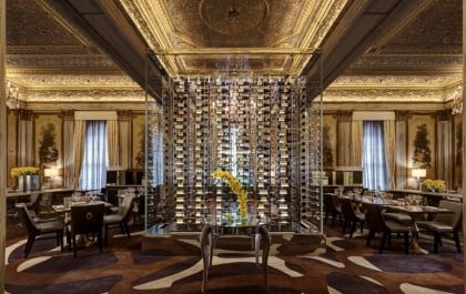 A glass wine cube in the center of the dining room