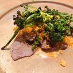 Beef served with charred broccoli