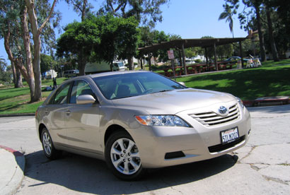 A three-quarter front view of a 2007 Toyota Camry LE 4-Cylinder