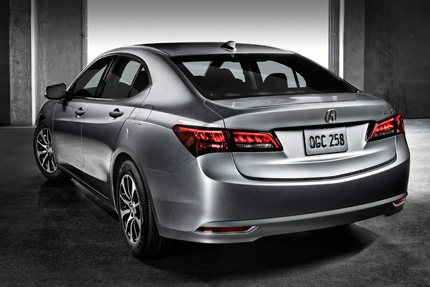 A three-quarter rear view of a 2015 Acura TLX
