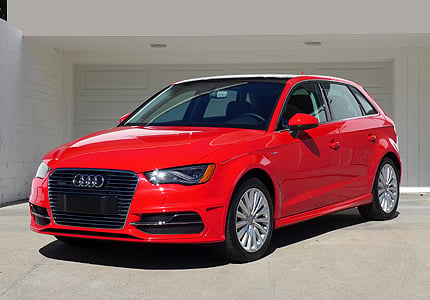 A three-quarter front view of a 2016 Audi A3 e-tron electric plug-in hatchback