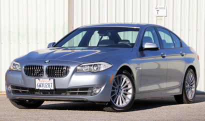 A three-quarter front view of a 2013 BMW ActiveHybrid 5