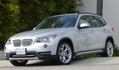A three-quarter front view of a 2013 BMW X1